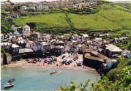 48. Downtown Port Isaac, with the spreading estate on the skyline